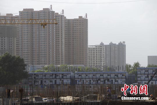 中國調低非限購市首套房首付比例釋放穩樓市信號
