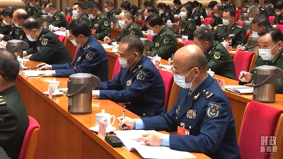 △2022年3月7日，解放軍和武警部隊代表團全體會議現場。