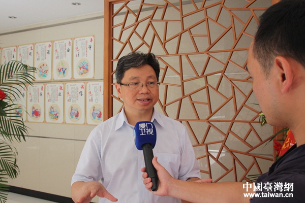 全國臺聯副會長楊毅周接受媒體採訪。