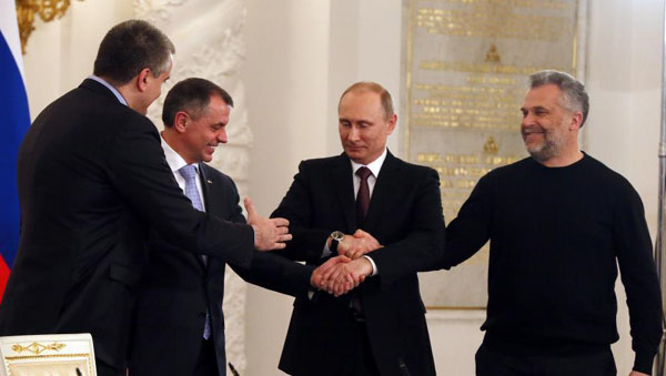 俄羅斯總統普京與克裏米亞議會主席、塞瓦斯托波爾簽署關於克裏米亞和塞瓦斯托波爾加入俄羅斯的協議