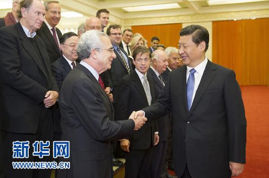 圖為：2013年11月2日，國家主席習近平在人民大會堂會見21世紀理事會北京會議外方代表。新華社記者 黃敬文 攝
