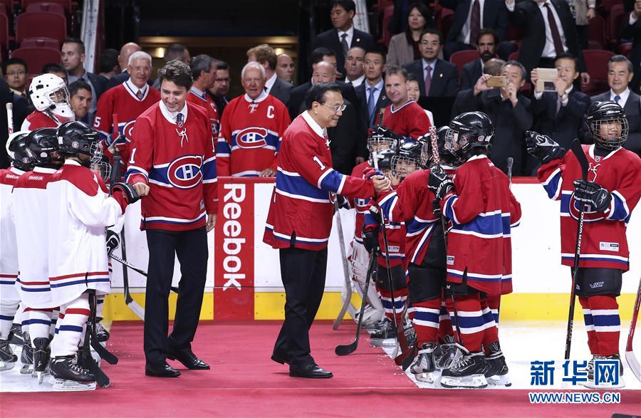 李克強與加拿大總理特魯多共同到訪蒙特利爾“加拿大人”冰球隊[組圖]