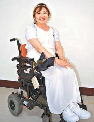 半身癱瘓的她 首位輪椅族導遊