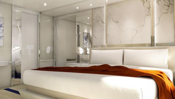 飛機上的雙人床毯子下面蓋著的就是係在床墊上的大安全帶，在飛機遇到強氣流時可以把睡覺的人固定在床上。（圖片來源：美國《華爾街日報》）