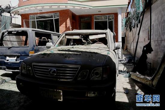 資料圖：在阿富汗首都喀布爾襲擊事件現場拍攝的被毀車輛。