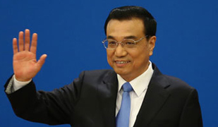 李克強反問外媒記者:你在中國買房了嗎?