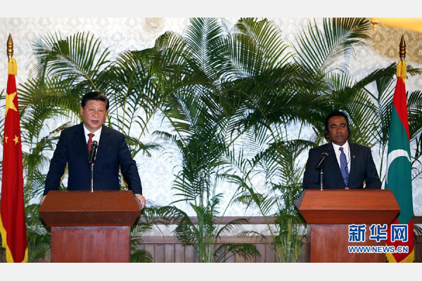 9月15日，國家主席習近平在馬累與馬爾地夫總統亞明共同會見記者。 新華社記者 鞠鵬 攝